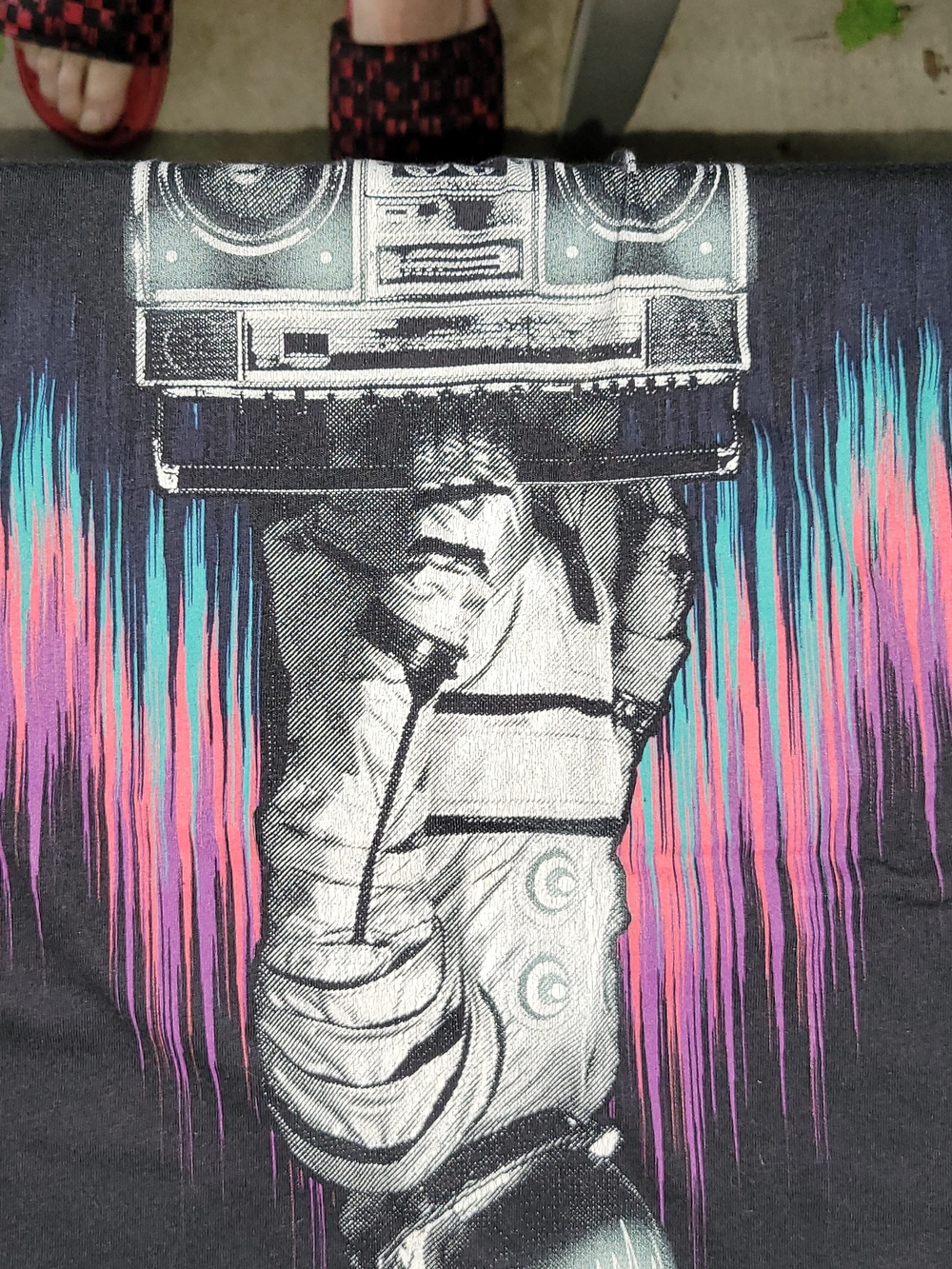 Graphic Boombox Astronaut Tee — Black with Teal & Pink Soundwaves